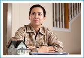 military female sitting at table to make home purchase